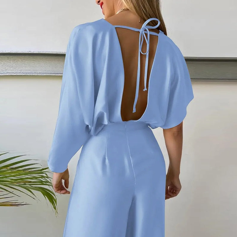 Stilla | Dyb V-Kortærmet Bred Ben Jumpsuit