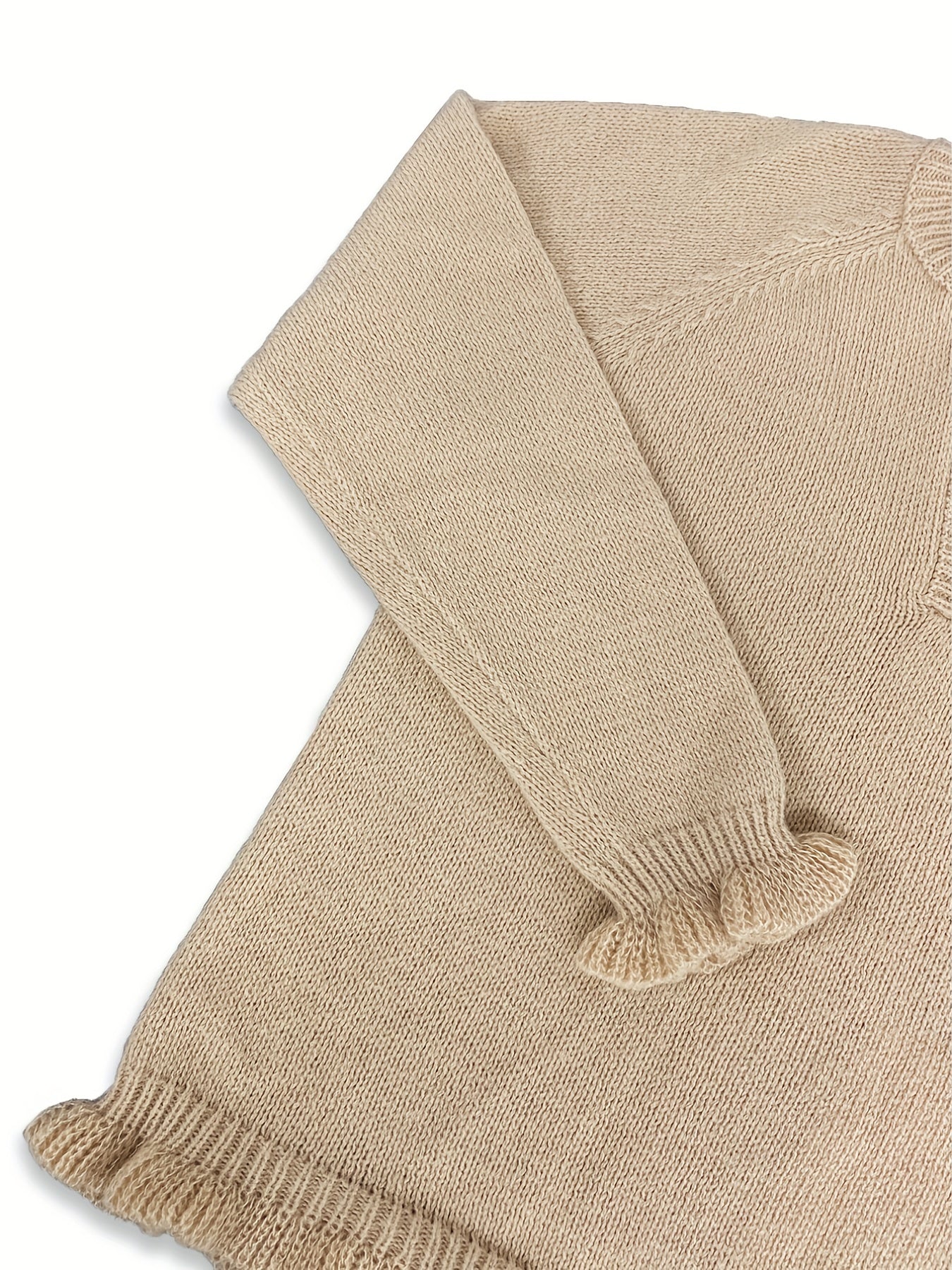 Stilla | V-hals sweater med flæser i bunden med knapper