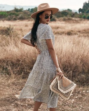 Stilla | Polka Dot V-hals Side Split Knap Op Midi Kjole