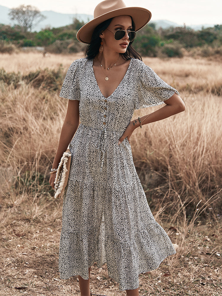 Stilla | Polka Dot V-hals Side Split Knap Op Midi Kjole