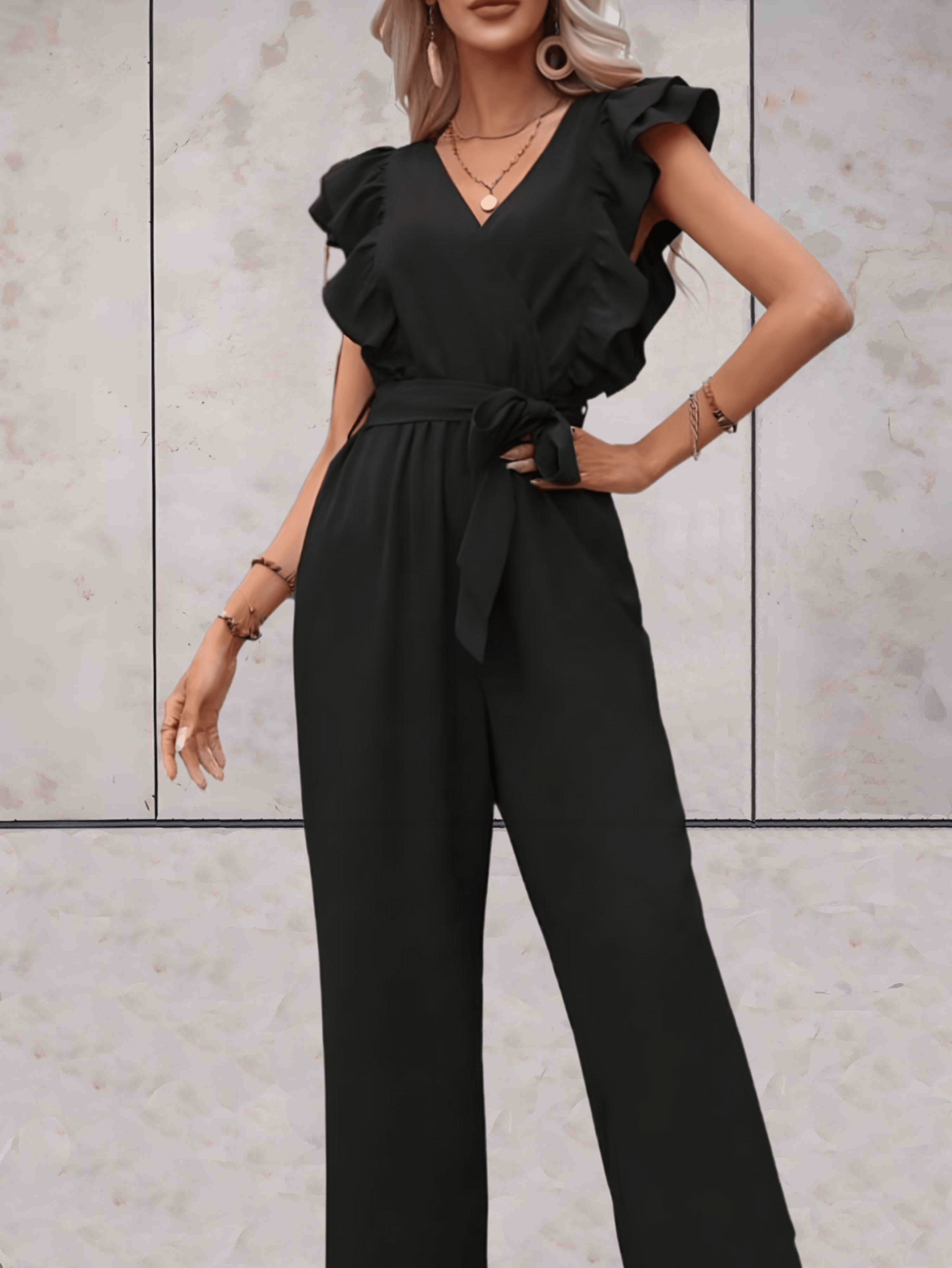 Stilla | Eleganz Afslappet jumpsuit med flæseærmer og linning